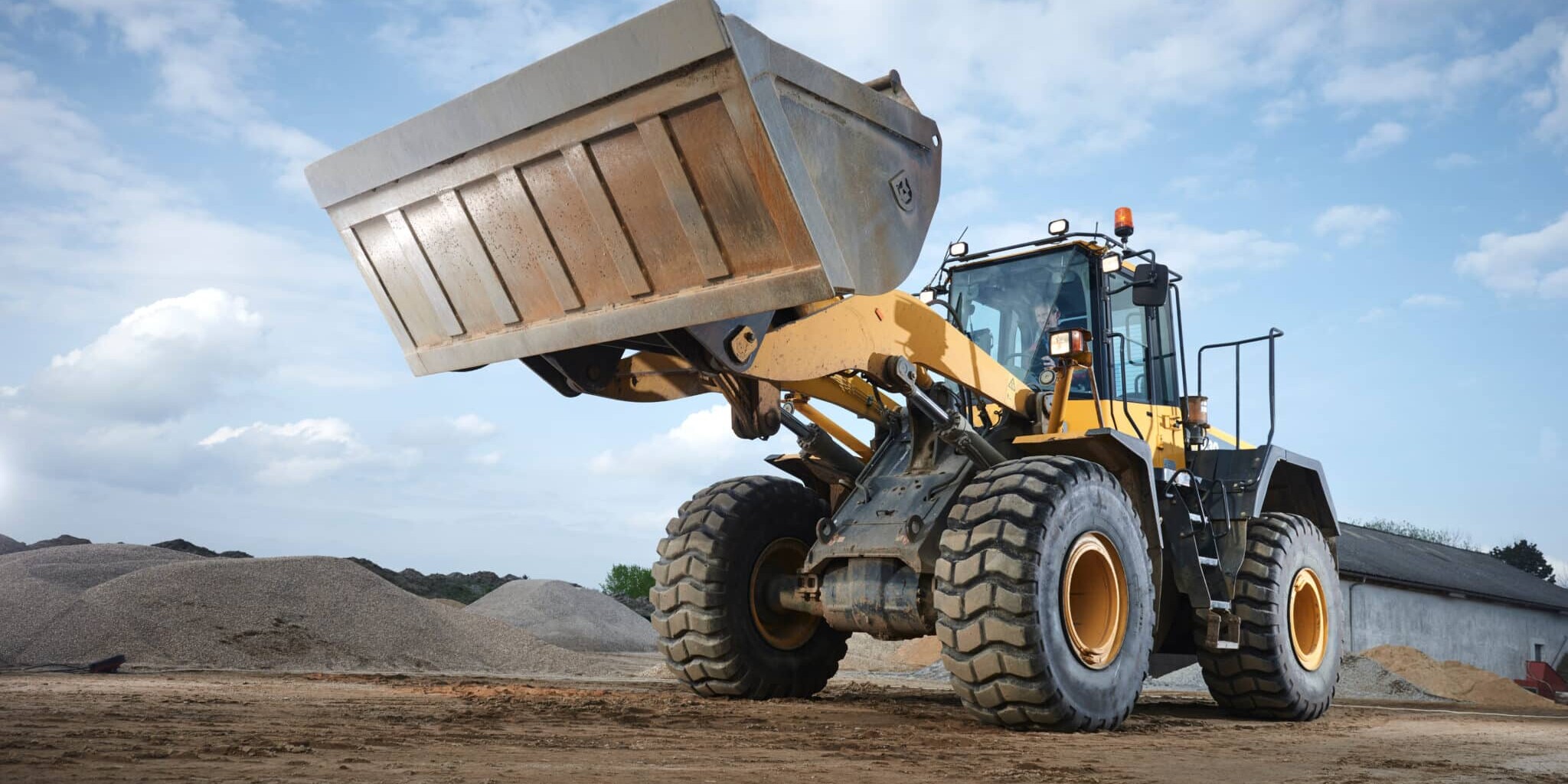tractors pushing dirt